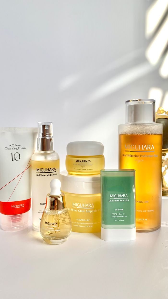 Chic arrangement of skincare essentials in soft lighting, showcasing elegance.