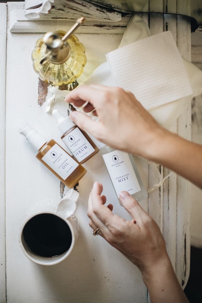 about-us-02 Flatlay of skincare products and coffee for a cozy morning routine.